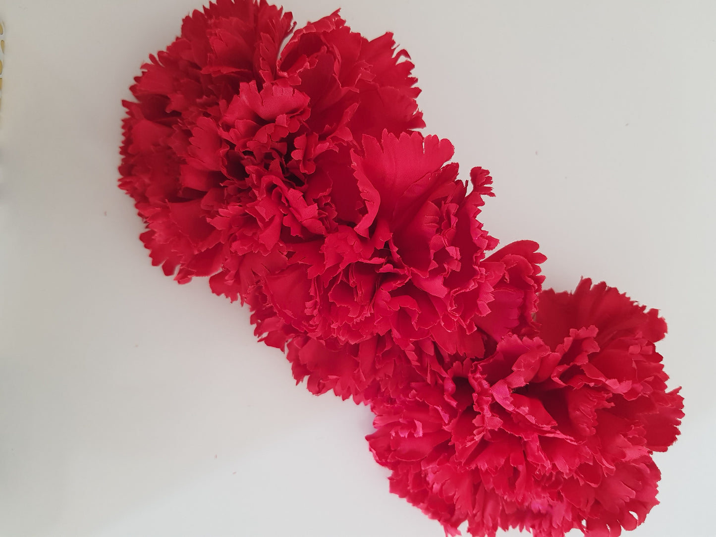 Corona claveles rojos